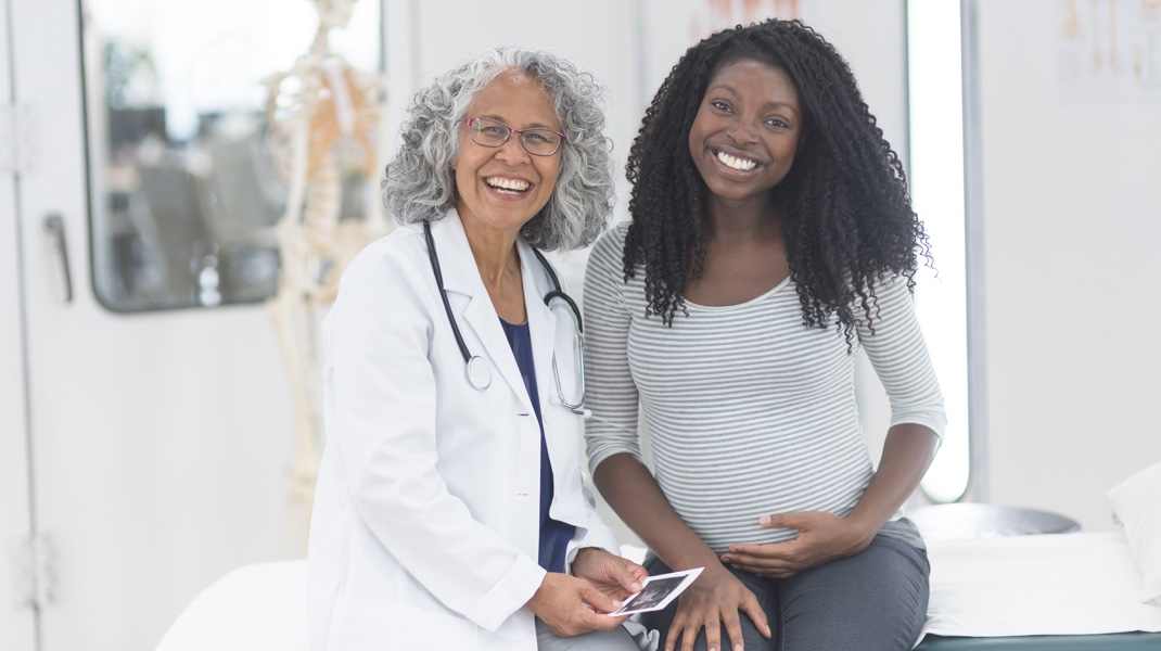 doctor and patient smiling
